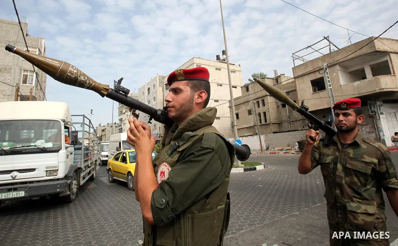 Members of Hamas national security forces Ca street as they celebrate a prisoner swap between Hamas and Israel, in Gaza City October 12, 2011. Prospects of a long-elusive deal with Hamas to secure the release of Israeli...