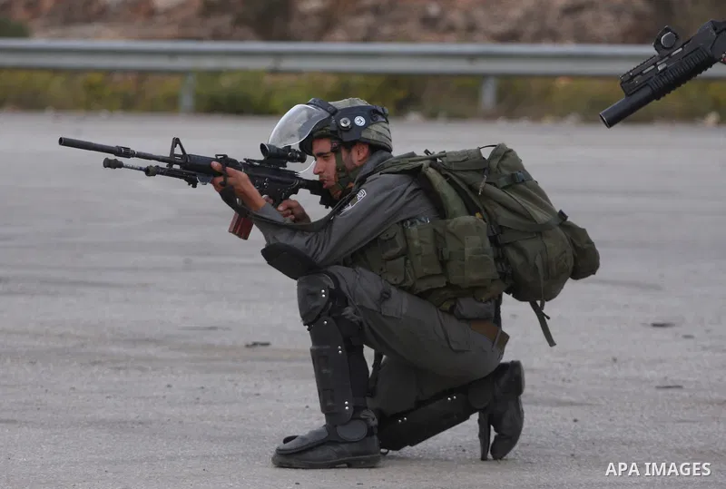 Israeli forces clash with Palestinian protestors following a demonstration calling for the release of prisoners held in Israeli jails and in support of inmates in hunger strike, on October 12, 2011 near Israel?s Ofer pri...