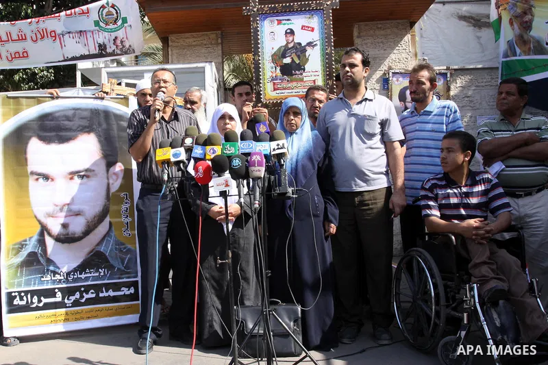 Family of the Palestinian Martyr, Mohammed Azmi Ferwana deliver speech during a press conference demanding the release of their son's body that being held by Israeli occupation in Gaza city on Oct. 13, 2011 . where he pa...