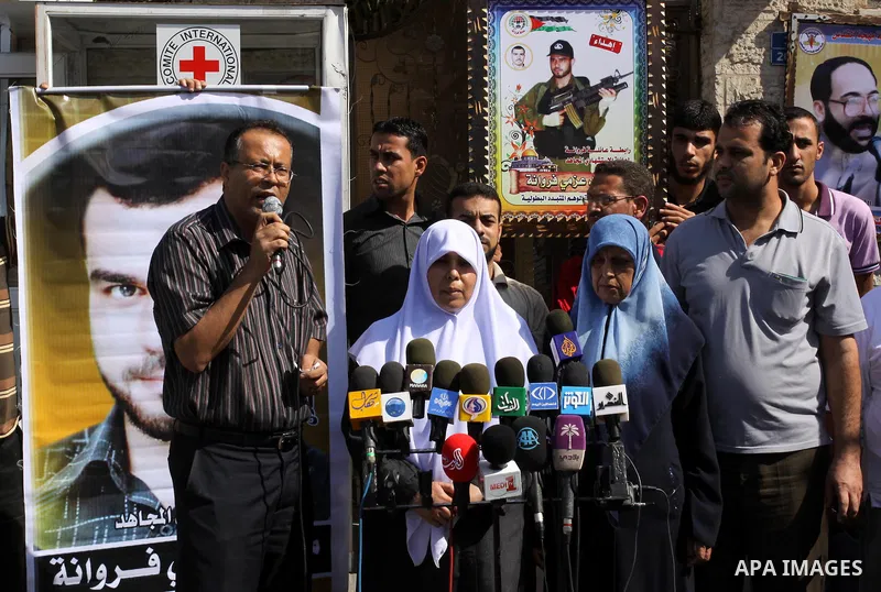 Family of the Palestinian Martyr, Mohammed Azmi Ferwana deliver speech during a press conference demanding the release of their son's body that being held by Israeli occupation in Gaza city on Oct. 13, 2011 . where he pa...