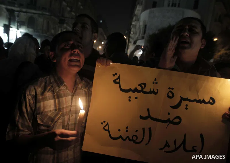 Nearly 3,000 Egyptian mourners gather in central Cairo on October 13, 2011 in honour of Coptic Christians among 25 people killed in weekend clashes during a demonstration over an attack on a church. Egypt's government sa...