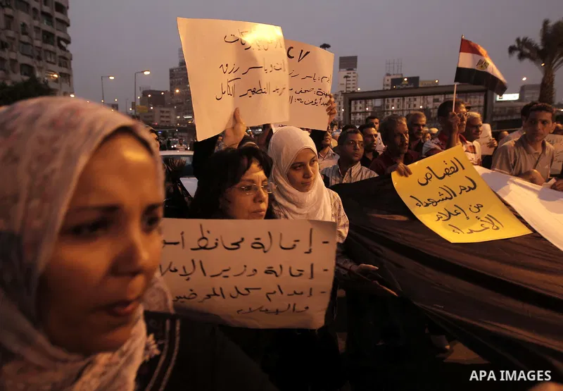Nearly 3,000 Egyptian mourners gather in central Cairo on October 13, 2011 in honour of Coptic Christians among 25 people killed in weekend clashes during a demonstration over an attack on a church. Egypt's government sa...