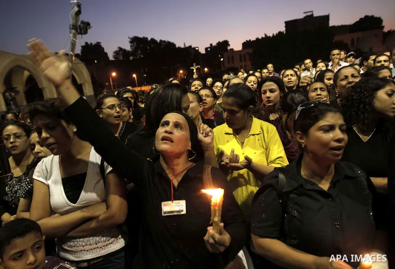 Nearly 3,000 Egyptian mourners gather in central Cairo on October 13, 2011 in honour of Coptic Christians among 25 people killed in weekend clashes during a demonstration over an attack on a church. Egypt's government sa...