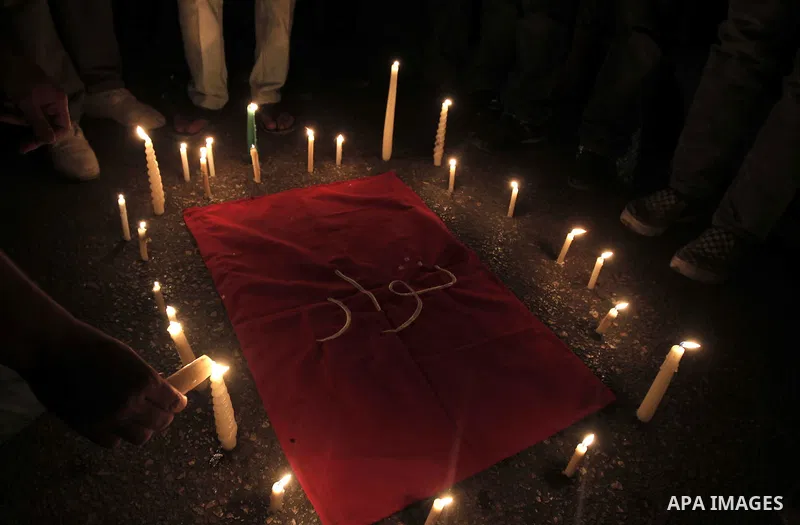 Nearly 3,000 Egyptian mourners gather in central Cairo on October 13, 2011 in honour of Coptic Christians among 25 people killed in weekend clashes during a demonstration over an attack on a church. Egypt's government sa...