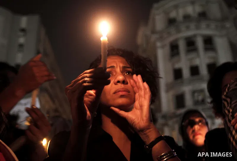 Nearly 3,000 Egyptian mourners gather in central Cairo on October 13, 2011 in honour of Coptic Christians among 25 people killed in weekend clashes during a demonstration over an attack on a church. Egypt's government sa...