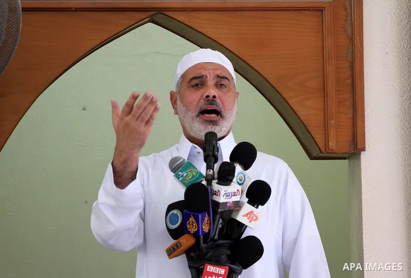 Palestinian prime minister in Gaza Strip, Ismail Haniyeh attends Friday prayers in Gaza City October 14, 2011. Israeli soldier Gilad Shalit will be freed from five years of captivity in the Gaza Strip some time next week...