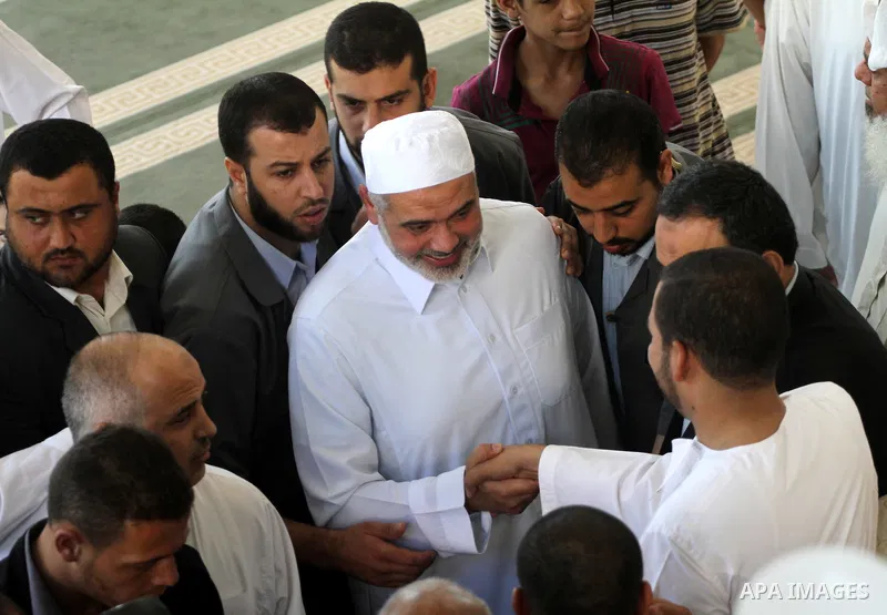 Palestinian prime minister in Gaza Strip, Ismail Haniyeh attends Friday prayers in Gaza City October 14, 2011. Israeli soldier Gilad Shalit will be freed from five years of captivity in the Gaza Strip some time next week...