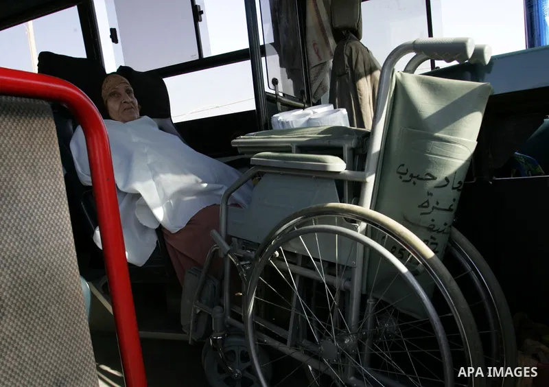 Palestinian pilgrims arrive at the Rafah border crossing between the Gaza Strip and Egypt on their way to the annual hajj or pilgrimage in the Saudi Muslim holy city of Mecca, on October 14, 2011. Photo by Abed Rahim Kha...