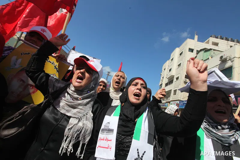 Palestinian relatives prisoners attend a protest calling for the release of their sons held in Israeli jails next the International Red Cross in Gaza City, Gaza Strip, on Oct. 15, 2011. Captive Israeli soldier Gilad Shal...