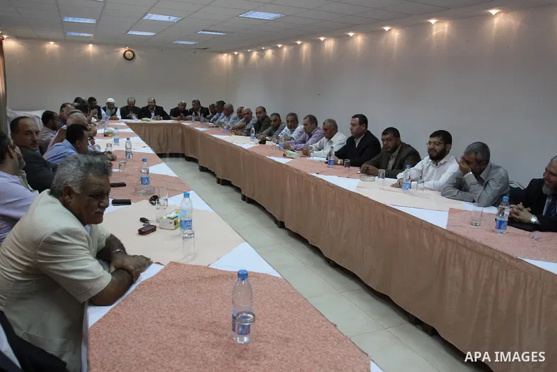 Palestinian factions leaders attend a meeting with the participation of all human rights organizations to discuss how to receive prisoners held in Israeli jails in Gaza City, oct, 15. 2011. Photo by Mohammed Asad