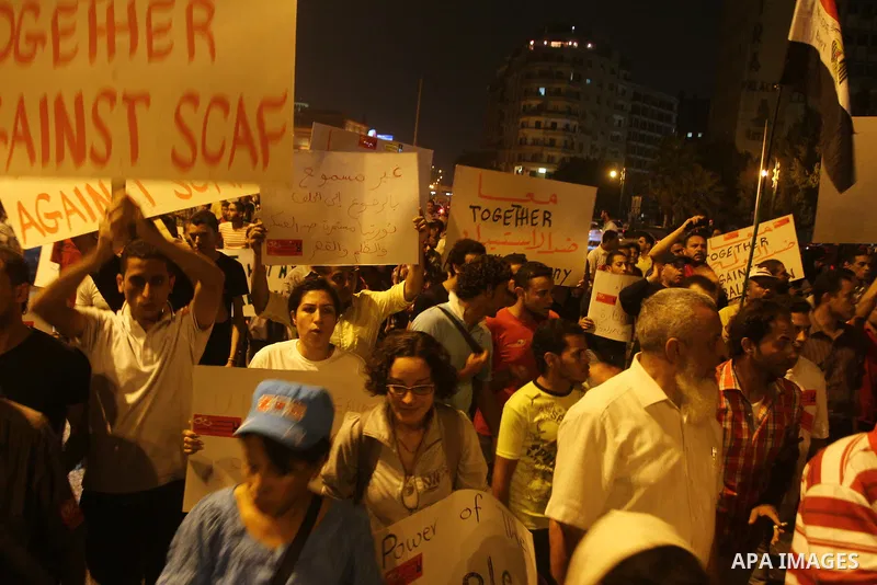 Nearly 3,000 Egyptian mourners gather in in Cairo's Tahrir Square on Oct.15, 2011, for a candlelight vigil in honor of Coptic Christians among 25 people killed in weekend clashes during a demonstration over an attack on...