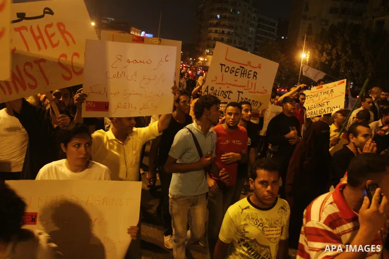 Nearly 3,000 Egyptian mourners gather in in Cairo's Tahrir Square on Oct.15, 2011, for a candlelight vigil in honor of Coptic Christians among 25 people killed in weekend clashes during a demonstration over an attack on...
