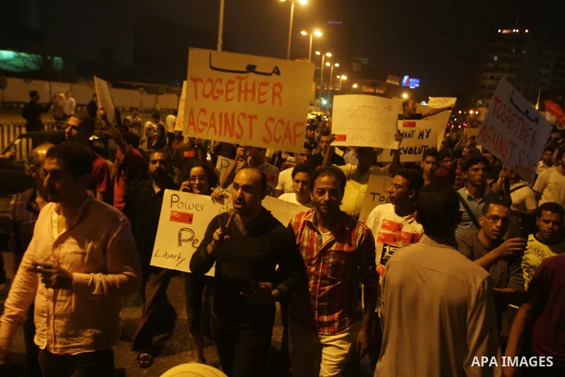 Nearly 3,000 Egyptian mourners gather in in Cairo's Tahrir Square on Oct.15, 2011, for a candlelight vigil in honor of Coptic Christians among 25 people killed in weekend clashes during a demonstration over an attack on...
