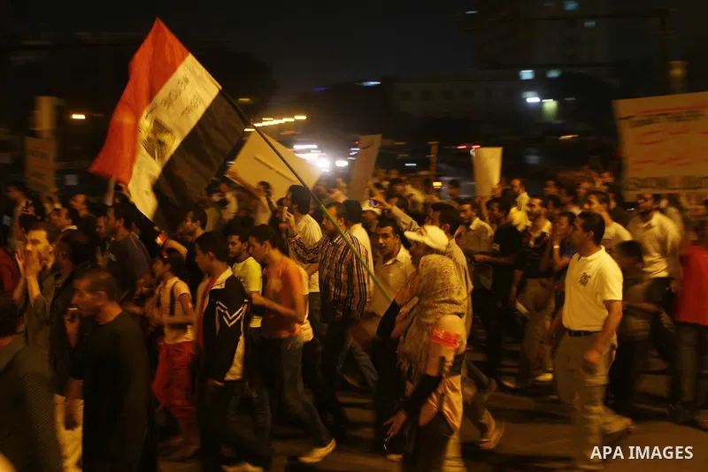 Nearly 3,000 Egyptian mourners gather in in Cairo's Tahrir Square on Oct.15, 2011, for a candlelight vigil in honor of Coptic Christians among 25 people killed in weekend clashes during a demonstration over an attack on...