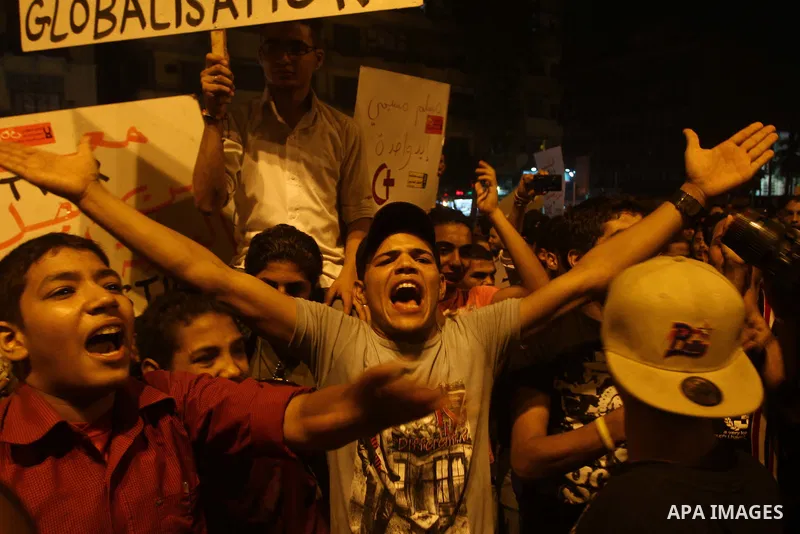 Nearly 3,000 Egyptian mourners gather in in Cairo's Tahrir Square on Oct.15, 2011, for a candlelight vigil in honor of Coptic Christians among 25 people killed in weekend clashes during a demonstration over an attack on...