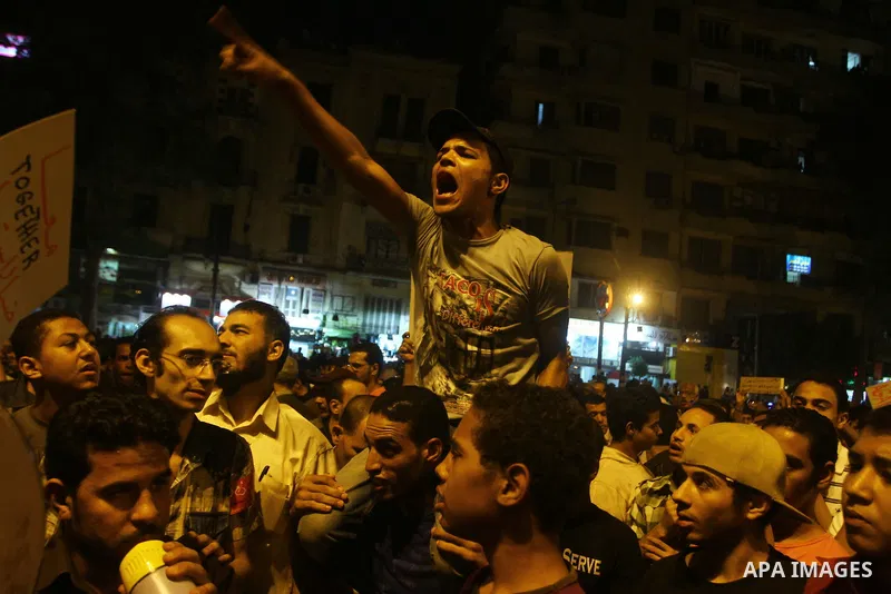 Nearly 3,000 Egyptian mourners gather in in Cairo's Tahrir Square on Oct.15, 2011, for a candlelight vigil in honor of Coptic Christians among 25 people killed in weekend clashes during a demonstration over an attack on...