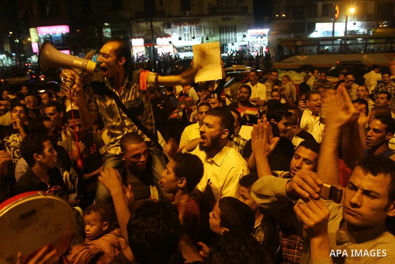Nearly 3,000 Egyptian mourners gather in in Cairo's Tahrir Square on Oct.15, 2011, for a candlelight vigil in honor of Coptic Christians among 25 people killed in weekend clashes during a demonstration over an attack on...