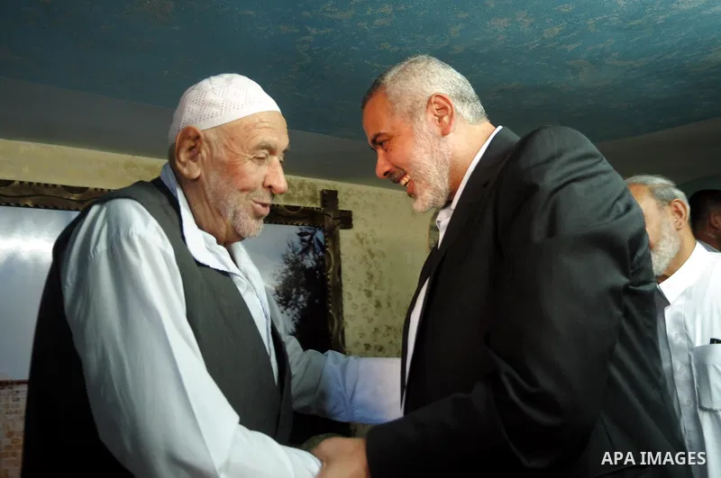 Palestinian Prime Minister in Gaza Strip, Ismail Haniyeh visits with his ministers and legislators one of Hamas founders, Abed el-Fatah Doukhan in Gaza City, Sunday, Oct. 16, 2011. The relatives of Israelis killed in Pal...