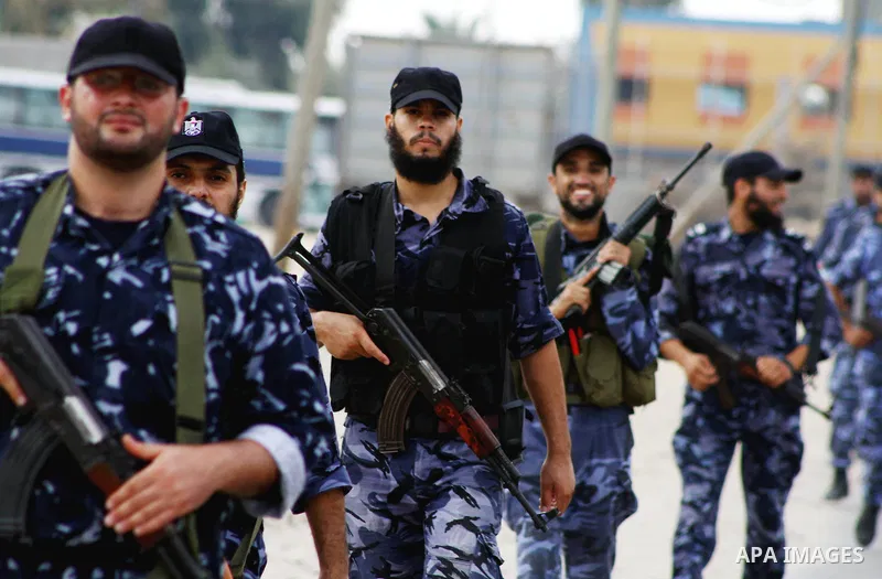 Palestinian Hamas policemen patrol in the central Gaza Strip October 17, 2011, as they patrol during preparations for the release of prisoners in a swap that is expected to take place on Tuesday. Hamas prepared a heroes'...