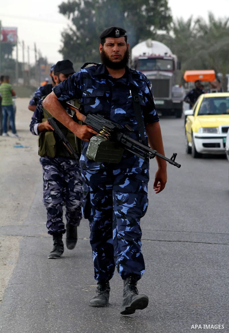 Palestinian Hamas policemen patrol in the central Gaza Strip October 17, 2011, as they patrol during preparations for the release of prisoners in a swap that is expected to take place on Tuesday. Hamas prepared a heroes'...
