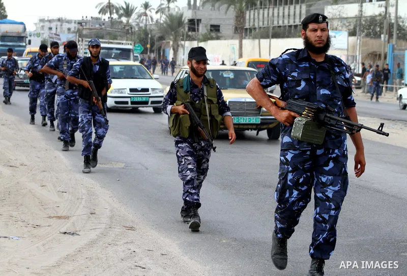 Palestinian Hamas policemen patrol in the central Gaza Strip October 17, 2011, as they patrol during preparations for the release of prisoners in a swap that is expected to take place on Tuesday. Hamas prepared a heroes'...