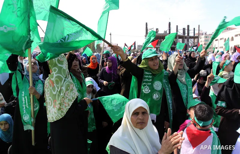 Relatives of Palestinian prisoners about to be freed in a prisoner swap between Hamas and Israel, celebrate as they prepare to receive them in Gaza city October 18, 2011. Gaza's Hamas Islamist rulers released captured Is...