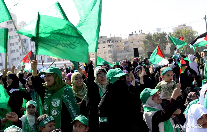 Relatives of Palestinian prisoners about to be freed in a prisoner swap between Hamas and Israel, celebrate as they prepare to receive them in Gaza city October 18, 2011. Gaza's Hamas Islamist rulers released captured Is...