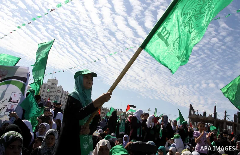 Relatives of Palestinian prisoners about to be freed in a prisoner swap between Hamas and Israel, celebrate as they prepare to receive them in Gaza city October 18, 2011. Gaza's Hamas Islamist rulers released captured Is...