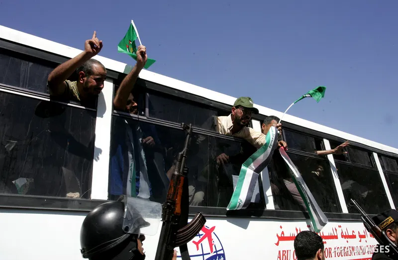Palestinian prisoners cross to the southern Gaza Strip from the Egyptian side of the Rafah border on Oct. 18, 2011 upon their release from Israeli prisons under a landmark deal to free abducted Israeli soldier Gilad Shal...