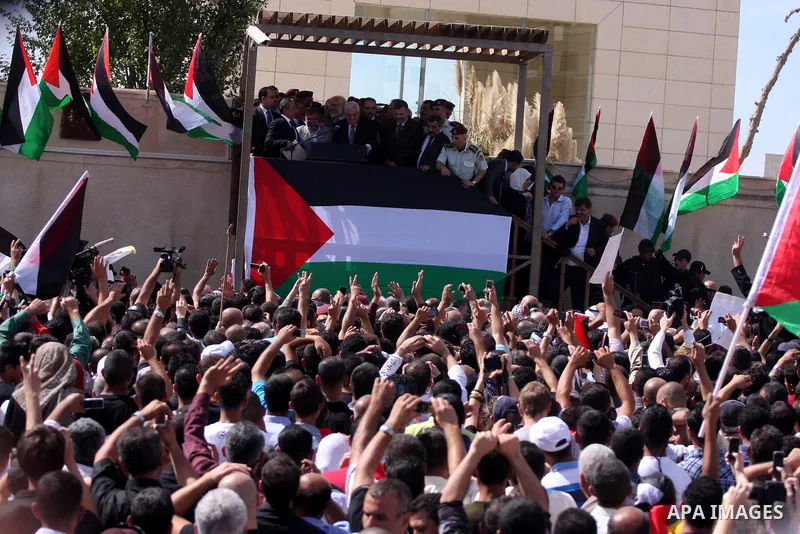 Palestinian president Mahmud Abbas welcomes hundreds of prisoners released from Israeli jails on Oct. 18, 2011 at the Palestinian Authority headquarters in the West Bank city of Ramallah. Hundreds of people gathered in R...