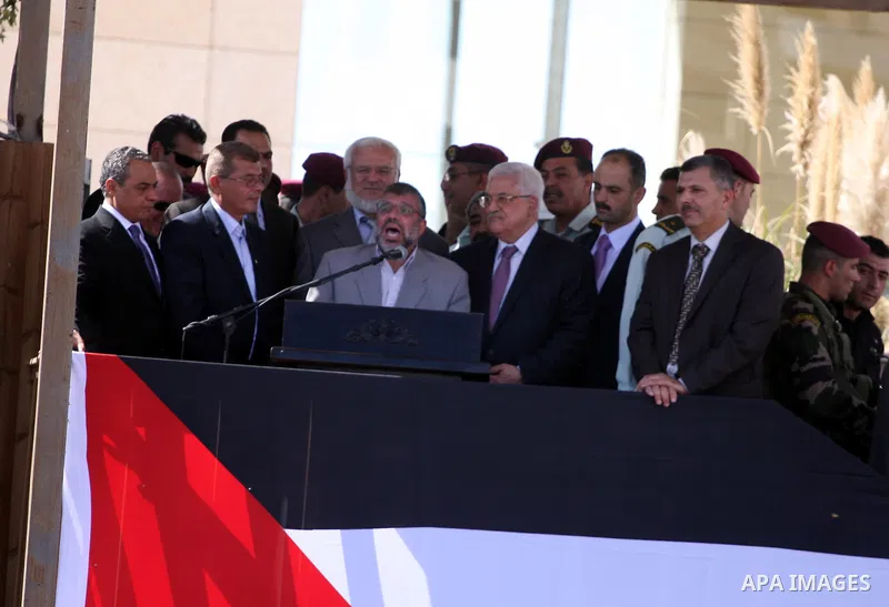 Palestinian president Mahmud Abbas welcomes hundreds of prisoners released from Israeli jails on Oct. 18, 2011 at the Palestinian Authority headquarters in the West Bank city of Ramallah. Hundreds of people gathered in R...