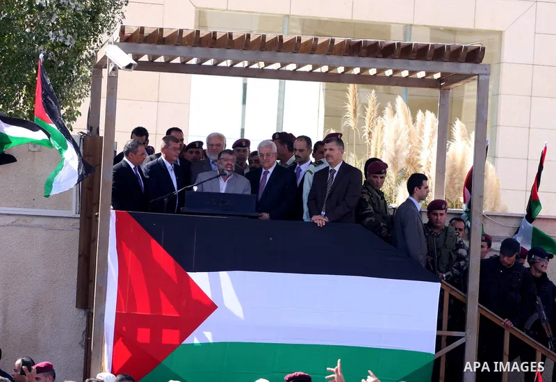 Palestinian president Mahmud Abbas welcomes hundreds of prisoners released from Israeli jails on Oct. 18, 2011 at the Palestinian Authority headquarters in the West Bank city of Ramallah. Hundreds of people gathered in R...