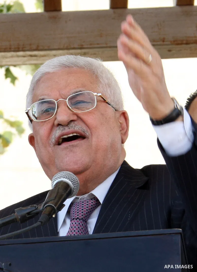 Palestinian president Mahmud Abbas welcomes hundreds of prisoners released from Israeli jails on Oct. 18, 2011 at the Palestinian Authority headquarters in the West Bank city of Ramallah. Hundreds of people gathered in R...