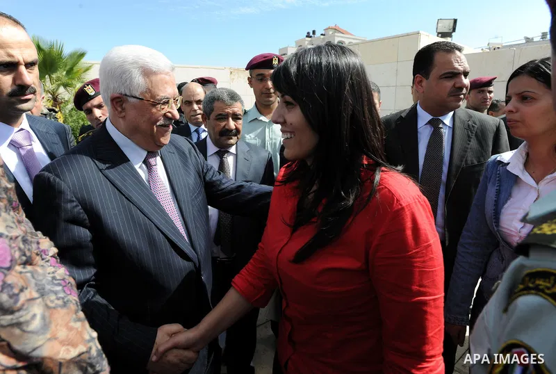 Palestinian president Mahmud Abbas welcomes hundreds of prisoners released from Israeli jails on Oct. 18, 2011 at the Palestinian Authority headquarters in the West Bank city of Ramallah. Hundreds of people gathered in R...