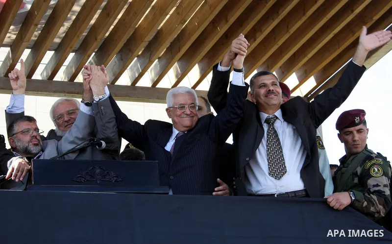 Palestinian president Mahmud Abbas welcomes hundreds of prisoners released from Israeli jails on Oct. 18, 2011 at the Palestinian Authority headquarters in the West Bank city of Ramallah. Hundreds of people gathered in R...