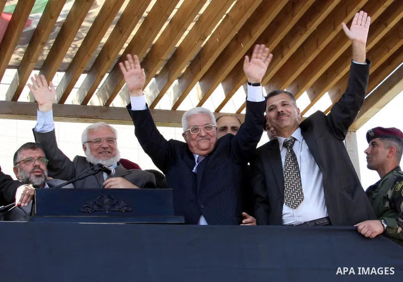 Palestinian president Mahmud Abbas welcomes hundreds of prisoners released from Israeli jails on Oct. 18, 2011 at the Palestinian Authority headquarters in the West Bank city of Ramallah. Hundreds of people gathered in R...
