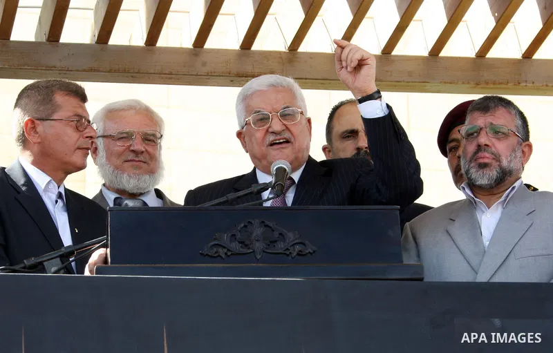 Palestinian president Mahmud Abbas welcomes hundreds of prisoners released from Israeli jails on Oct. 18, 2011 at the Palestinian Authority headquarters in the West Bank city of Ramallah. Hundreds of people gathered in R...