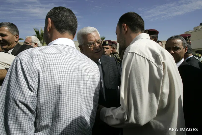 Palestinian president Mahmud Abbas welcomes hundreds of prisoners released from Israeli jails on Oct. 18, 2011 at the Palestinian Authority headquarters in the West Bank city of Ramallah. Hundreds of people gathered in R...