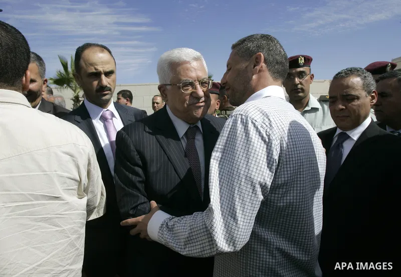 Palestinian president Mahmud Abbas welcomes hundreds of prisoners released from Israeli jails on Oct. 18, 2011 at the Palestinian Authority headquarters in the West Bank city of Ramallah. Hundreds of people gathered in R...
