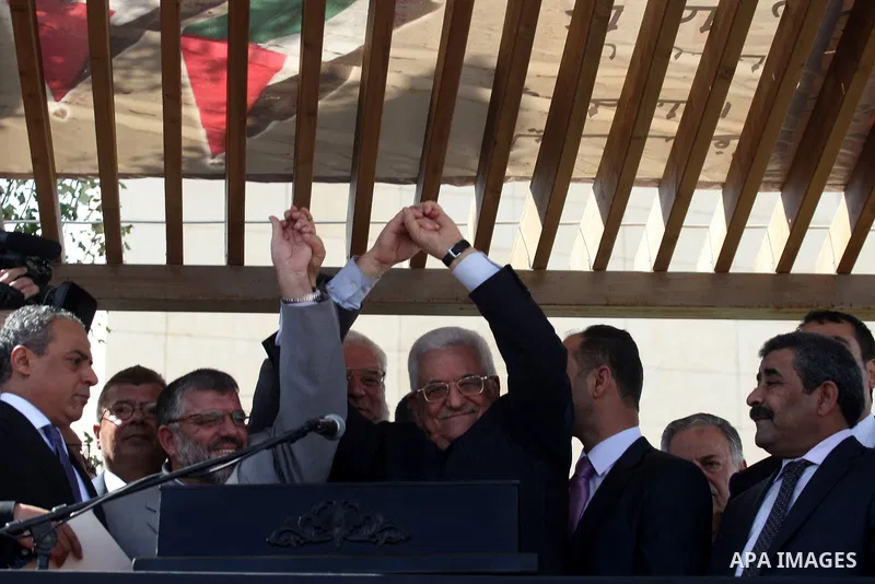 Palestinian president Mahmud Abbas welcomes hundreds of prisoners released from Israeli jails on Oct. 18, 2011 at the Palestinian Authority headquarters in the West Bank city of Ramallah. Hundreds of people gathered in R...
