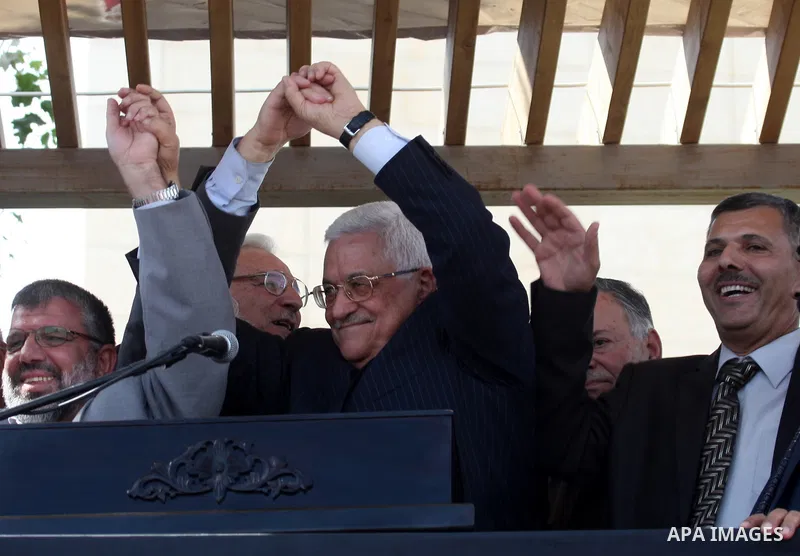 Palestinian president Mahmud Abbas welcomes hundreds of prisoners released from Israeli jails on Oct. 18, 2011 at the Palestinian Authority headquarters in the West Bank city of Ramallah. Hundreds of people gathered in R...