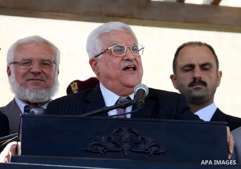 Palestinian president Mahmud Abbas welcomes hundreds of prisoners released from Israeli jails on Oct. 18, 2011 at the Palestinian Authority headquarters in the West Bank city of Ramallah. Hundreds of people gathered in R...