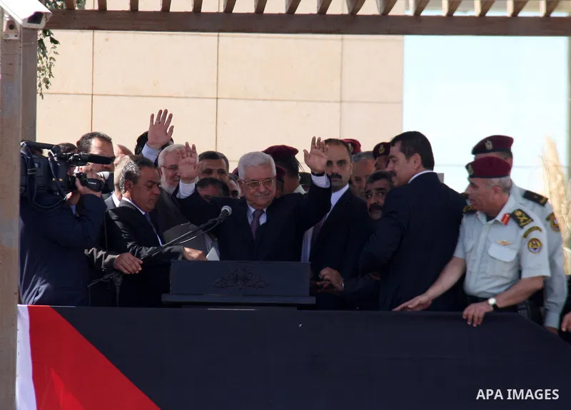 Palestinian president Mahmud Abbas welcomes hundreds of prisoners released from Israeli jails on Oct. 18, 2011 at the Palestinian Authority headquarters in the West Bank city of Ramallah. Hundreds of people gathered in R...
