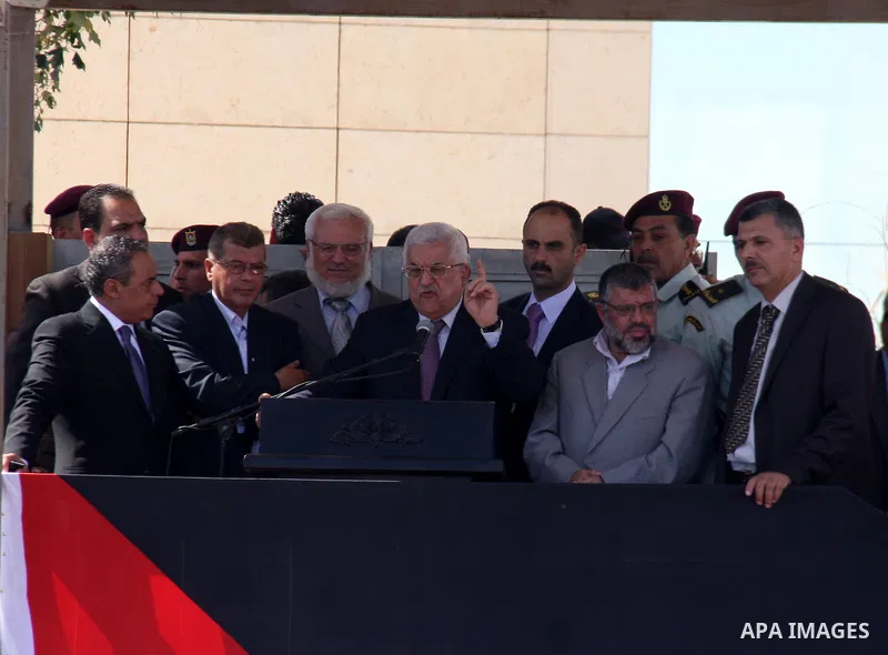 Palestinian president Mahmud Abbas welcomes hundreds of prisoners released from Israeli jails on Oct. 18, 2011 at the Palestinian Authority headquarters in the West Bank city of Ramallah. Hundreds of people gathered in R...