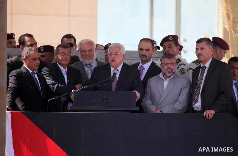 Palestinian president Mahmud Abbas welcomes hundreds of prisoners released from Israeli jails on Oct. 18, 2011 at the Palestinian Authority headquarters in the West Bank city of Ramallah. Hundreds of people gathered in R...