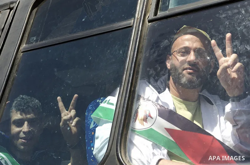Palestinians celebrate the release of prisoners in Gaza Strip, Tuesday, Oct. 18, 2011. Hamas agreed to release Israeli soldier Galit Schalit in exchange for 1,027 Palestinian prisoners, many of them serving life sentence...