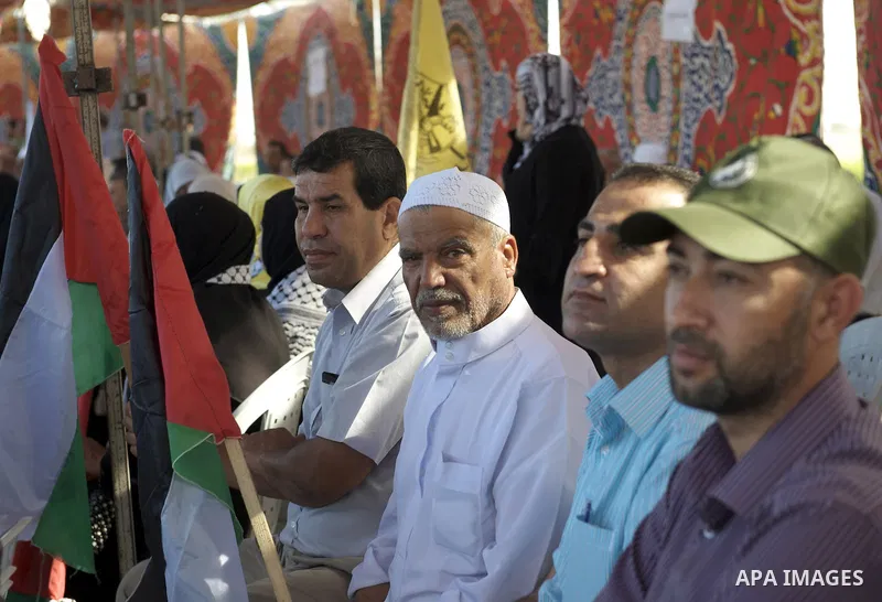 Palestinians celebrate the release of prisoners in Gaza Strip, Tuesday, Oct. 18, 2011. Hamas agreed to release Israeli soldier Galit Schalit in exchange for 1,027 Palestinian prisoners, many of them serving life sentence...