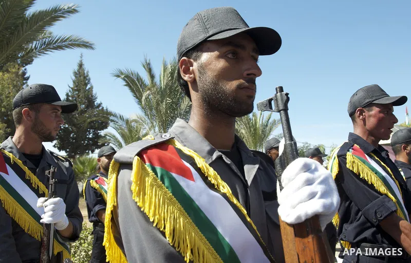 Palestinians celebrate the release of prisoners in Gaza Strip, Tuesday, Oct. 18, 2011. Hamas agreed to release Israeli soldier Galit Schalit in exchange for 1,027 Palestinian prisoners, many of them serving life sentence...
