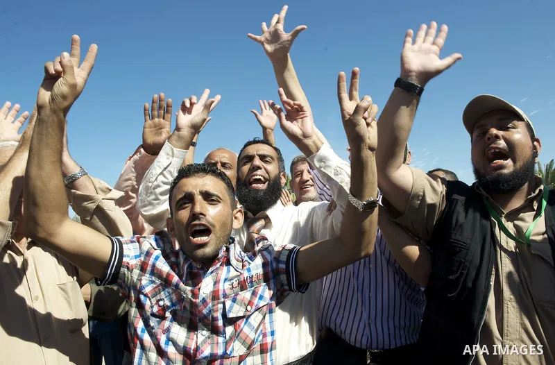 Palestinians celebrate the release of prisoners in Gaza Strip, Tuesday, Oct. 18, 2011. Hamas agreed to release Israeli soldier Galit Schalit in exchange for 1,027 Palestinian prisoners, many of them serving life sentence...