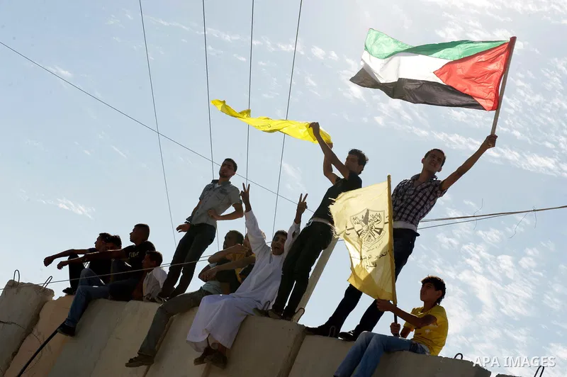 Palestinians celebrate the release of prisoners in Gaza Strip, Tuesday, Oct. 18, 2011. Hamas agreed to release Israeli soldier Galit Schalit in exchange for 1,027 Palestinian prisoners, many of them serving life sentence...